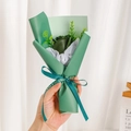 Detail of single soap rose bouquet in green wrap with Love Is Eternal ribbon - Dark Green