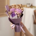 Detail of mini soap flower bouquet with purple roses and gypsophila in gift wrap - Purple