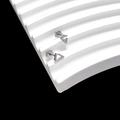 Macro shot of minimalist silver hollow triangle stud earrings on wavy display stand - Triangle V