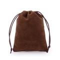 Detailed texture of brown velvet jewelry pouch with matching drawstring closure - Brown