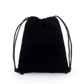 Detail of soft black velvet texture and drawstring closure on a jewelry storage pouch - Black