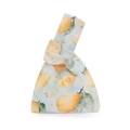 Dettaglio della borsa da polso in velluto con nodo e stampa di limoni ad acquerello - Limone