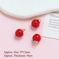 Detailed view of 9x12mm mini red enamel apple charms with golden rings for DIY jewelry - Red Apple