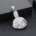 Macro shot of silver Saint Jude pendant with heart relief and polished metal texture - Silver Jesus Bust Pendant (No Chain)