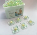 Green 5D concentrated laundry detergent beads in storage box with cleaning granules - 5-Cavity Camellia (4g 30 Pods) Box