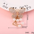 Eleganter Schmetterlingsanhänger mit weißen Strasssteinen und Perlen auf rosa Hintergrund - D465 Schmetterling mit schwarzen Augen