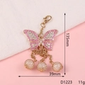 Portachiavi a farfalla con strass rosa e pendenti di perle in metallo dorato 135mm - D1223 Piccola farfalla con bordo rosa