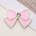 Accessorio fiocco rosa con bordi in perle e cristallo centrale brillante - Argento Rosa