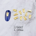 Macro shot of LF6667 4.5x9mm golden Celtic knot metal nail charms on blue faux nail - Gold Celtic Weave Knot (6667)