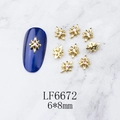 Detail of 6x8mm gold alloy star nail charms with sparkling rhinestone inlay on blue nails - Gold Octagonal Star AB Rhinestone (6672)