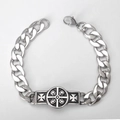 Macro detail of stainless steel cuban link bracelet featuring skull and cross embossing - Style B-Four Skulls Cross / 18cm