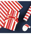 Detailed view of red and white striped Christmas gift wrapping paper with gold foil dots - Red White Stripe Polka Dot