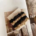 Set of six silk satin scrunchies in black and champagne gold on a display card - 6-Piece Set / Type E Black + Gold