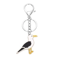 Creative metal seagull keychain with black, white, and yellow enamel in silver finish - Pigeon