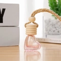 Pink heart-shaped glass car perfume diffuser with wooden cap and hanging cord - Gold Wire Five-Line Cap / Pink