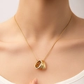 Detailed close-up of a minimalist gold necklace with irregular pleated double ring pendant - Irregular Pleated Double Ring Style (N0204)