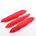 Three red polka dot sponge hair rollers for heatless curls on a white background - Red
