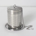 Detail view of SUS304 stainless steel tea infuser with hexagonal mesh and chain - Medium Machined Honeycomb Style + Base