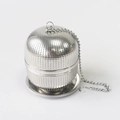 Macro shot of 304 stainless steel ball tea infuser with chain and base on white background - Large Ball + Base