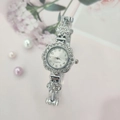 Elegant flower shaped quartz watch for women featuring sparkling rhinestones and silver metal - Silver Case White Dial