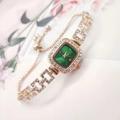 Detail of square green dial watch with crystal accents and adjustable sliding chain band - Rose Gold Case Green Dial