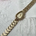 Reloj de cuarzo dorado para mujer con esfera de cabeza de serpiente y brazalete de metal - Esfera Dorada Oro