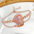 Detail of rose gold heart watch featuring crystal-encrusted floral chain and slide buckle - Rose Gold Pink