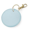 Macro view of light blue faux leather circular keychain with gold lobster clasp and metal ring - Assembled / Sky Blue