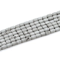 Macro shot of silver-gray cylindrical geode agate beads with natural mineral texture - Barrel Beads 6x8mm/23pcs / Plated White K