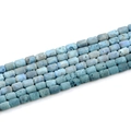 Blue cylindrical geode agate beads with natural stone textures in a tidy vertical layout - Barrel Beads 6x8mm/23pcs / Sky Blue