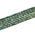 Macro detail of turquoise barrel-shaped agate beads showing natural geode textures - Barrel Beads 6x8mm/23pcs / Grass Green