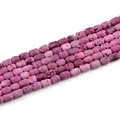 Macro shot of purple geode agate barrel beads with natural stone texture on white back - Barrel Beads 6x8mm/23pcs / Rose Red