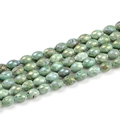 Macro shot of green oval druzy agate beads with iridescent finish and natural texture - 8*12mm/19pcs / Grass Green
