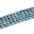 Detailed view of iridescent blue electroplated geode agate beads with crystal textures - 8*12mm/19pcs / Sky Blue