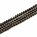 Detailed macro view of 10mm matte natural stone beads with fine porous texture for DIY - Electroplated Black