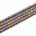 Macro shot of 10mm round purple gold lava stone beads with natural mineral texture - Electroplated Rainbow