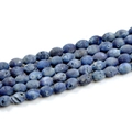 Macro shot of blue geode agate drum beads showing natural texture for handmade jewelry - Aqua
