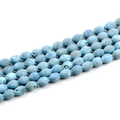 Macro shot of light blue druzy agate beads with natural porous texture for DIY jewelry - Sky Blue