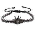 Detail view of black beaded bracelet with adjustable crown charm and sparkling rhinestones - Crown Bracelet / Gunmetal