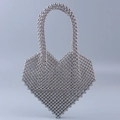 Handcrafted silver heart-shaped beaded handbag with metallic beads for elegant women - Silver