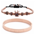 Macro detail of rose gold crown bracelet with blue zircon and Roman numeral bangle - Rose Gold Blue Zirconia Crown Set