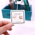 Korean style asymmetrical flower and wreath stud earrings on a luxury display card - EA-ZK029 5x5cm New LJ Border