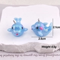 Macro view of blue iridescent dolphin pendants for DIY jewelry with dimensions and weight - AB Colorful Blue Dolphin