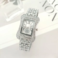 Orologio donna argento con strass, cassa tonneau, numeri romani e decorazione floreale - Argento