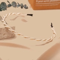 Detail of twisted white pearls on gold metal headband with elegant French retro style - Twisted Wrapped Pearl Headband-French Style