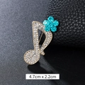 Musical note brooch with blue crystal flower and white rhinestones in gold plating - Blue Flower Music Note Gold (XD9423)