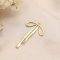 Golden bow-shaped 18K gold-plated pendant accessory on champagne satin background - Long Ribbon Bow (PJ0019) / Gold