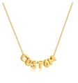 Collana dorata con ciondolo a lettere Custom Bubble su sfondo bianco - Lettera A / Oro