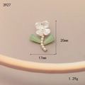 Macro detail of enamel flower charm with pearl core and leaves measuring 20mm by 17mm - Pearl Green Leaf Flower (3927)