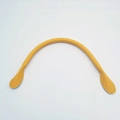 Detail of yellow leather handbag handle with pre-punched stitching holes for DIY repair - Yellow